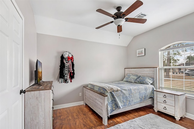 19475 Humaya, Porter, TX 77365 - bedroom with baseboards, dark wood finished floors, vaulted ceiling, and ceiling fan