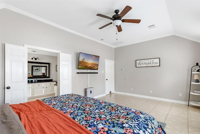 19475 Humaya, Porter, TX 77365 - bedroom with light tile patterned floors, ornamental molding, baseboards, lofted ceiling, and connected bathroom
