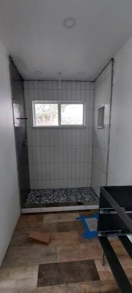 bathroom featuring walk in shower