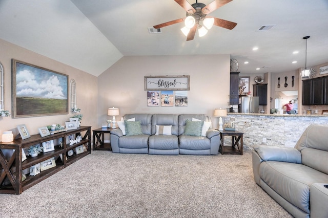 carpeted living room with lofted ceiling, recessed lighting, visible vents, and a ceiling fan