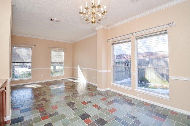 unfurnished room with a notable chandelier, ornamental molding, a textured ceiling, and a wealth of natural light