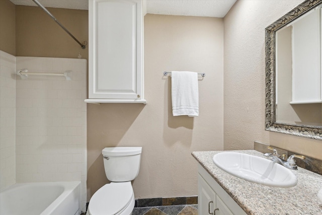 full bathroom with tiled shower / bath combo, vanity, and toilet