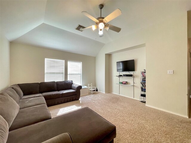 living room featuring carpet, lofted ceiling, and ceiling fan