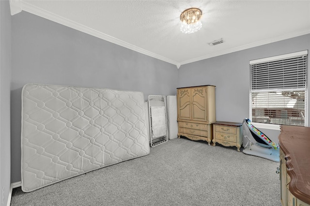 bedroom with ornamental molding and a chandelier