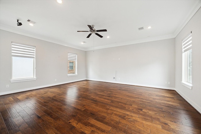 unfurnished room with dark hardwood / wood-style flooring, plenty of natural light, and ornamental molding