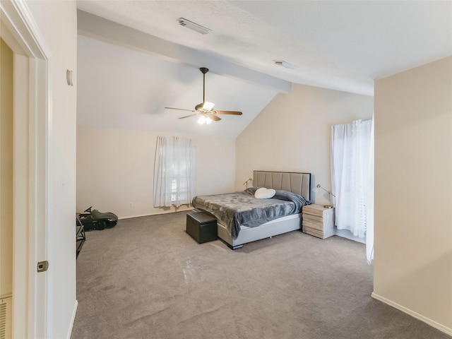 bedroom featuring ceiling fan, carpet floors, and vaulted ceiling with beams