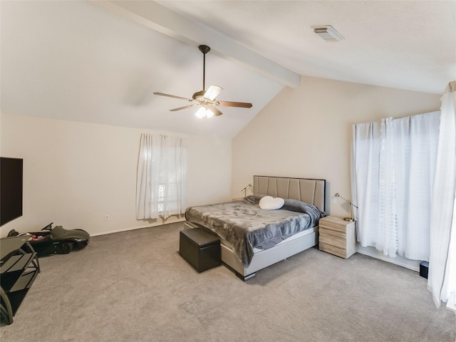 carpeted bedroom featuring lofted ceiling with beams and ceiling fan