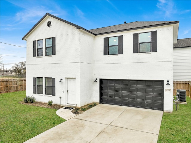 view of front property featuring a garage, a front lawn, and central air condition unit