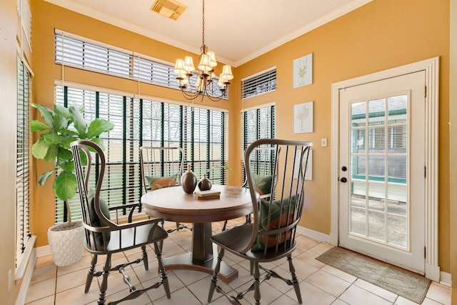 dining room featuring light tile patterned floors, a notable chandelier, and ornamental molding