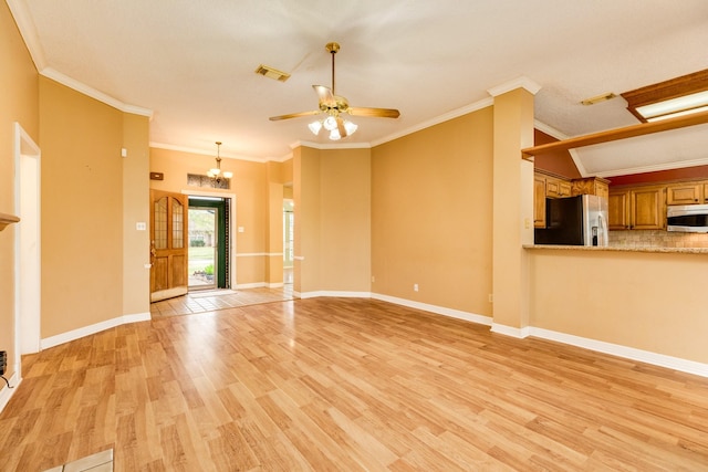 unfurnished living room featuring crown molding, light hardwood / wood-style flooring, and ceiling fan with notable chandelier