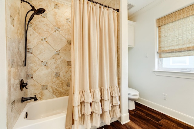 bathroom featuring crown molding, shower / bath combo, toilet, and hardwood / wood-style flooring