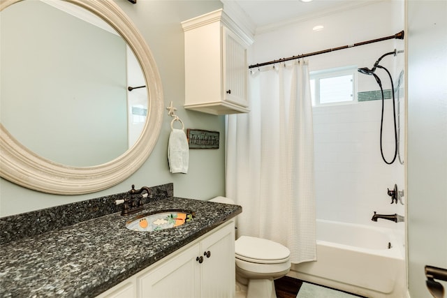 full bathroom with shower / bath combo, vanity, crown molding, and toilet