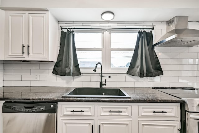 kitchen with range hood, sink, stainless steel appliances, and white cabinets