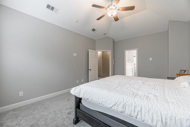 bedroom featuring lofted ceiling, connected bathroom, carpet, and ceiling fan