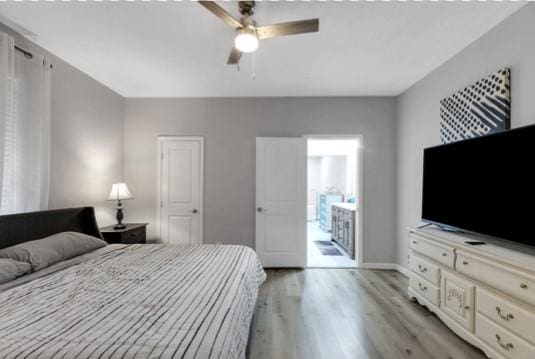 bedroom with access to outside, light hardwood / wood-style floors, and ceiling fan