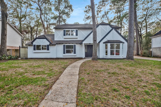 view of front of home with a front lawn