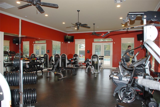 gym with crown molding and french doors