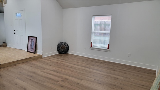 spare room featuring light wood-type flooring