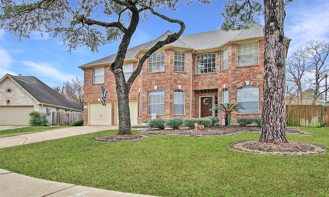 view of front facade featuring a garage and a front lawn