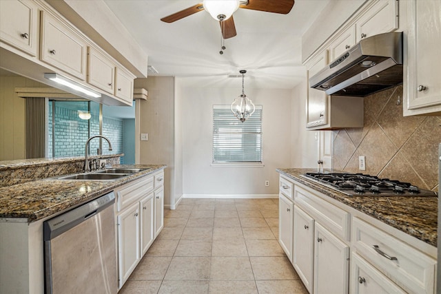 kitchen featuring white cabinetry, appliances with stainless steel finishes, and sink