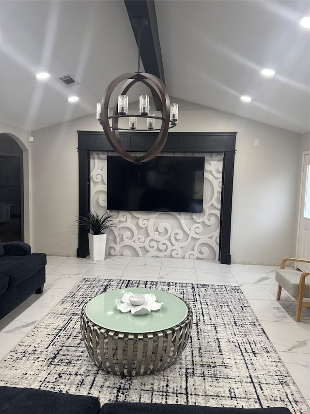 living room featuring vaulted ceiling