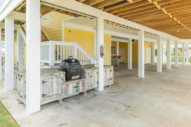 view of patio / terrace with area for grilling and exterior bar