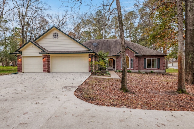 single story home featuring a garage