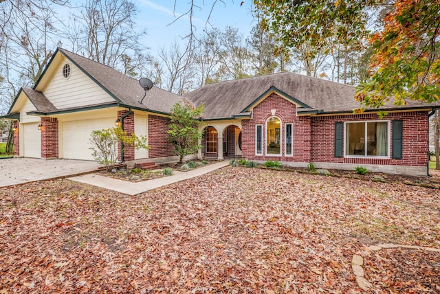 single story home featuring a garage