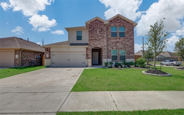 view of front property featuring a garage and a front yard