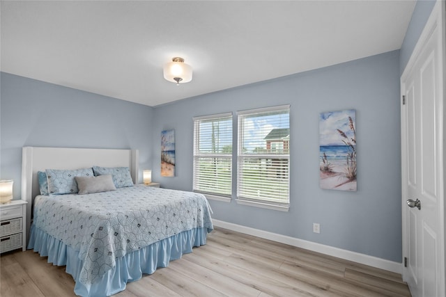 bedroom featuring light hardwood / wood-style flooring