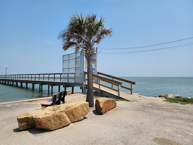 view of dock with a water view