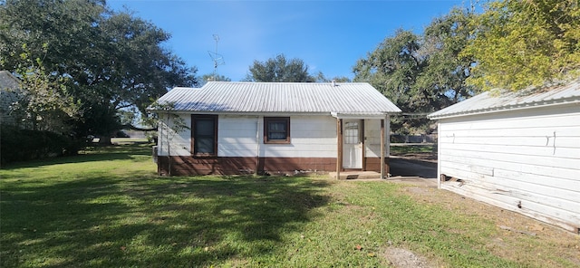 exterior space with a yard