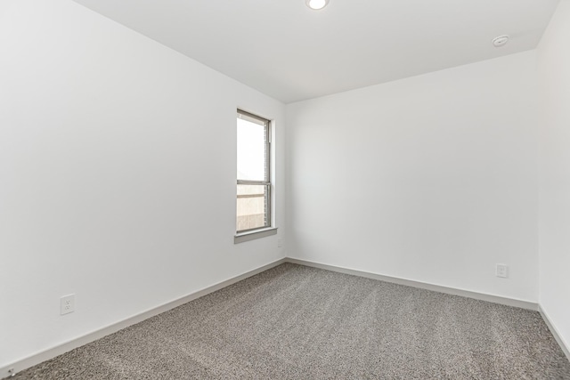 unfurnished room with carpet