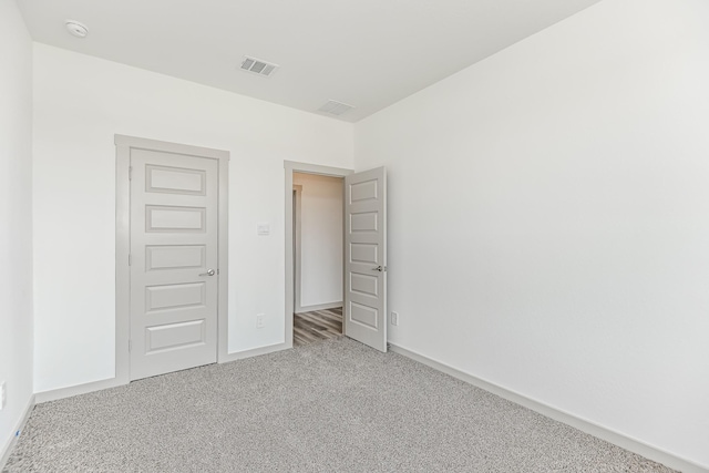 unfurnished bedroom featuring carpet floors