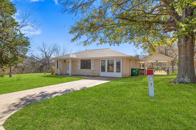 rear view of property with a yard