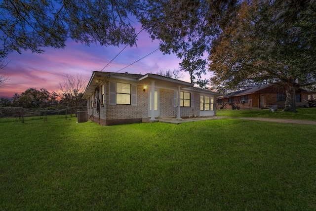 view of front of house with a lawn