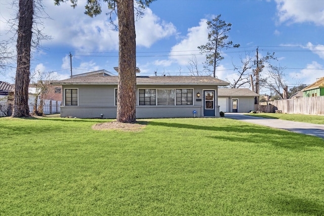 ranch-style house with a front yard