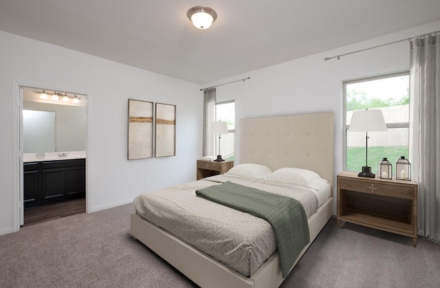 carpeted bedroom featuring multiple windows, sink, and connected bathroom