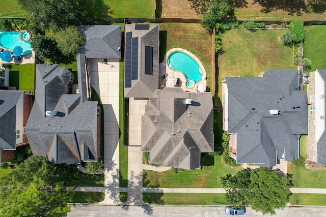 birds eye view of property with a residential view