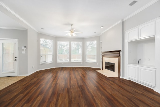 unfurnished living room with visible vents, baseboards, dark wood-style floors, and a high end fireplace