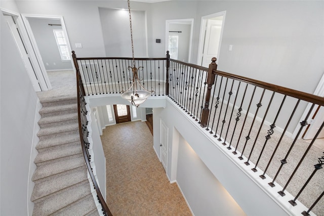 stairs featuring baseboards