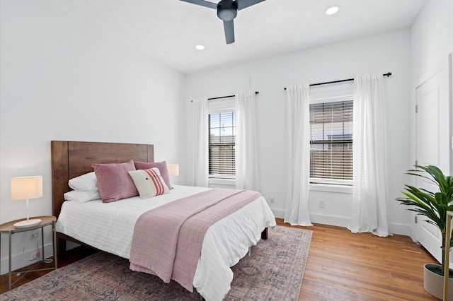 bedroom featuring ceiling fan and wood-type flooring