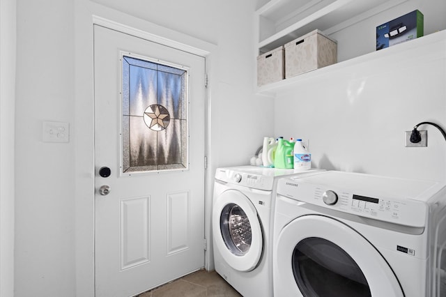 clothes washing area with separate washer and dryer