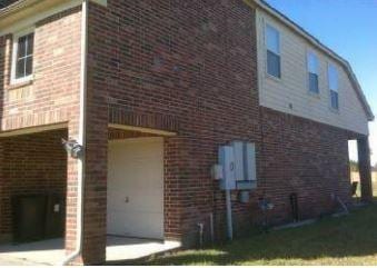 view of side of property featuring a garage