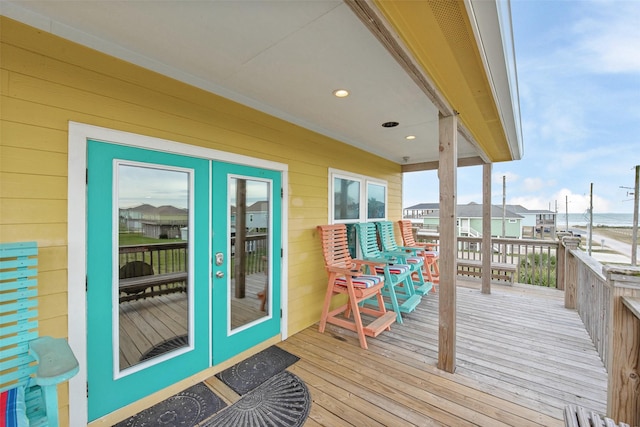 wooden terrace featuring french doors