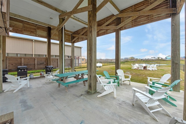 view of patio / terrace with an outdoor fire pit