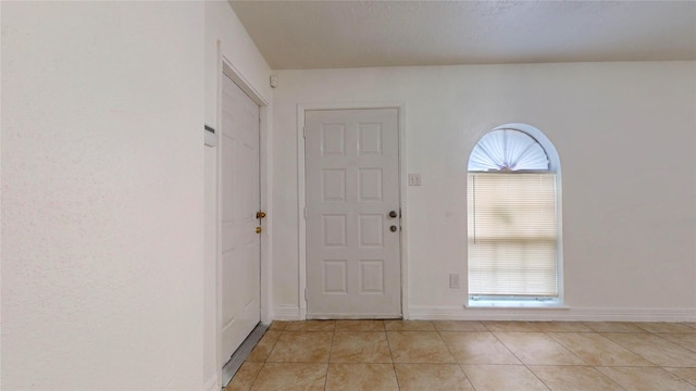 view of tiled foyer entrance