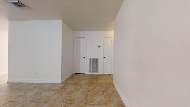 interior space with light tile patterned flooring