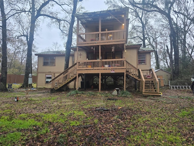 rear view of property with a deck