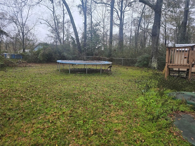 view of yard featuring a trampoline